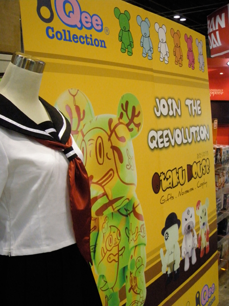 Jigoku Shoujo costume beside the 'Return of Qee' poster